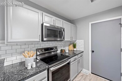 Kitchen with granite counters