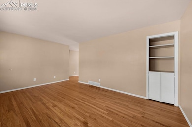 Living Room looking into nook area.
