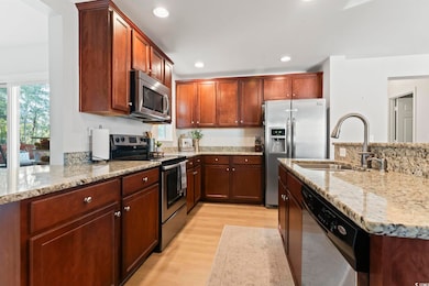 Kitchen featuring sink, light hardwood / wood-styl