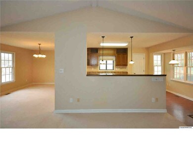Looking from great room into kitchen and dining room