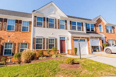 FRONT EXTERIOR W/ ATTACHED GARAGE, PAVED DRIVEWAY,