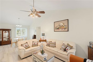 Living room featuring light wood-type flooring, ce