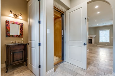 Powder Room and Elevator right at front door
