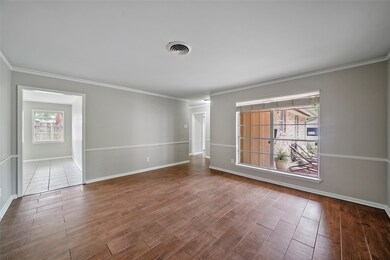 The large picture window in the living room allows