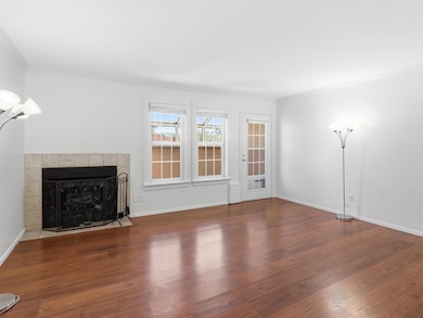 The living area opens up to a covered balcony, extending your living space outdoors.
