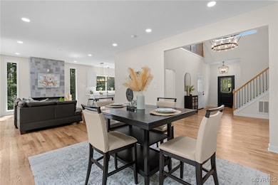 Dining space featuring light wood-type flooring, a