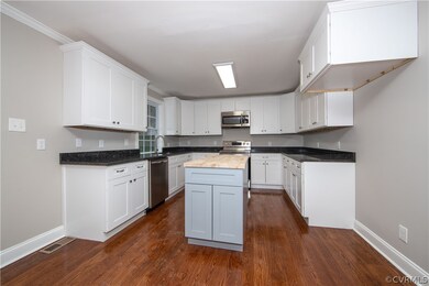 This beautiful kitchen boasts stainless steel appl