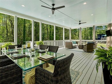 Sunroom / solarium with an outdoor living space an