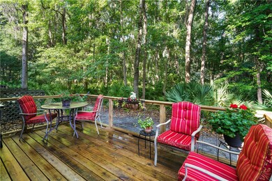 Beautiful deck overlooking wooded area.