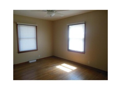Bedroom. Main floor,  nice hardwood floors.  Walls