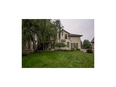 Lovely Curly Willow tree and retaining walls add t
