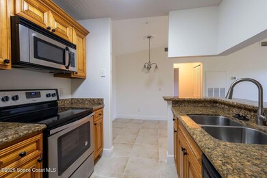7667 N Wickham Rd unit 822, Melbourne, FL 32940 - photo 5