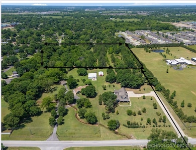 

Shared easement road to 129th E ave with homeown