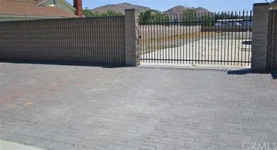 Ample parking area outside the gate