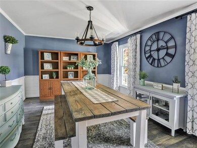 A SPACIOUS DINING ROOM w/ NEW PERGO-PLANK FLOORING