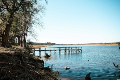 Dock featuring a water view