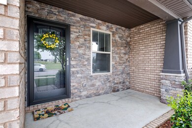 Front porch offers a great view of the farm across the street. 