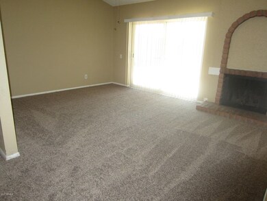 VAULTED LIVING ROOM WITH GAS FIREPLACE