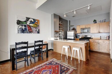 Kitchen featuring appliances with stainless steel