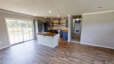The kitchen island faces the living room allowing
