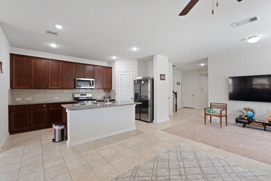 This spacious living room seamlessly connects with