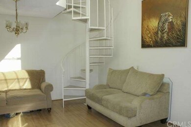 This large living room is well-lite and has room f