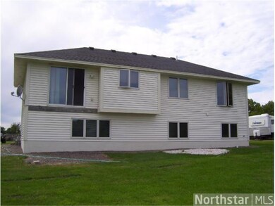 Back of home. Slider door leads to the dining room
