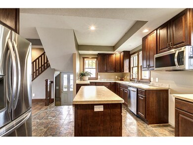 Handy island and stainless steel appliances.