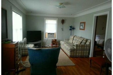 Living Room. Spacious living room with cove ceilin
