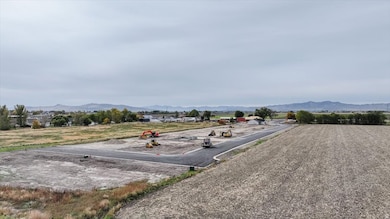 Surrounding community featuring a mountain view