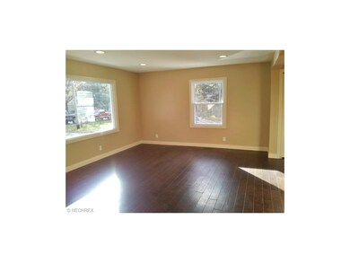 Spacious LR with handscraped hardwood floors. Tons