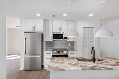 5833 Holmes Dr, Orlando, FL 32808 - photo 5