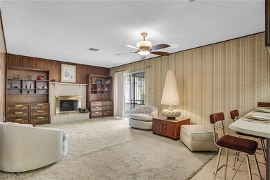 Family room with beautiful brick fireplace, ceilin