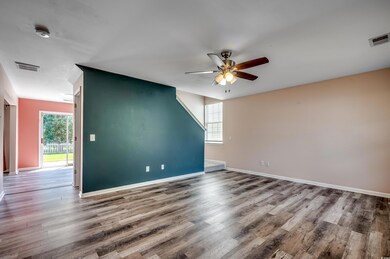 Spare room with hardwood / wood-style flooring and