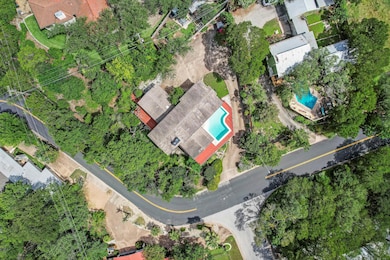 Aerial view of property and surrounding area with