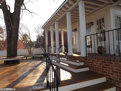 Exterior Back - wrap around brick porch and beauti
