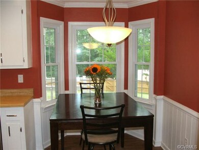 Kitchen eat in area with bay window, chandelier, c