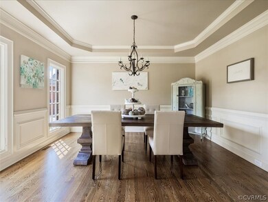 The dining room off the foyer with beautiful hardw