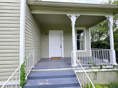 Doorway to property with a porch