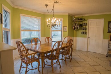 Family-sized breakfast area hosts a true bay windo