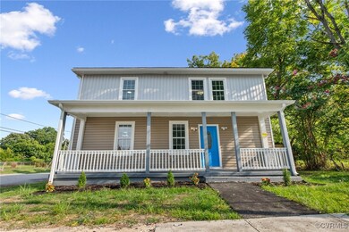 View of front of house featuring covered porch