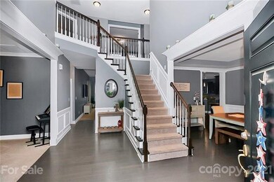 Welcoming two-story foyer