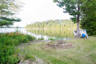 Shorefront looking south, fire pit...