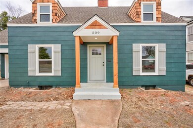 Updated exterior with an adorable front porch!