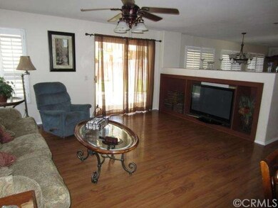 Family Room with a Built in Media Niche, Shutters,