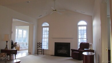 Living room with Cathedral ceiling and fireplace