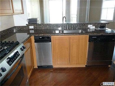 kitchen view, granite counters, stainless steel ap