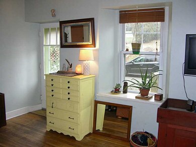 Living Room. This charming home has tons of charac