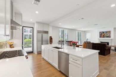 Kitchen featuring light hardwood / wood-style floo