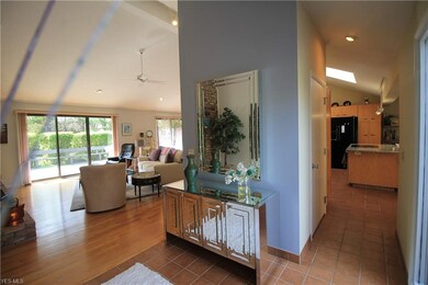 Wood/Ceramic Floors throughout Vaulted Living Room